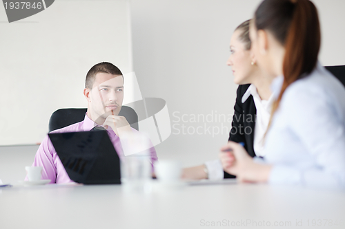 Image of Group of young business people at meeting