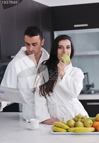 Image of young couple have fun in modern kitchen