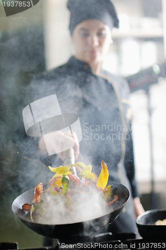 Image of chef preparing meal