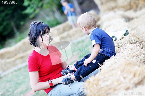 Image of woman and child have fun outdoor