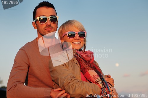 Image of couple in love  have romantic time on boat