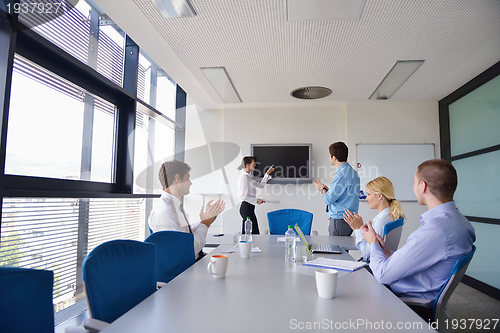 Image of business people in a meeting at office