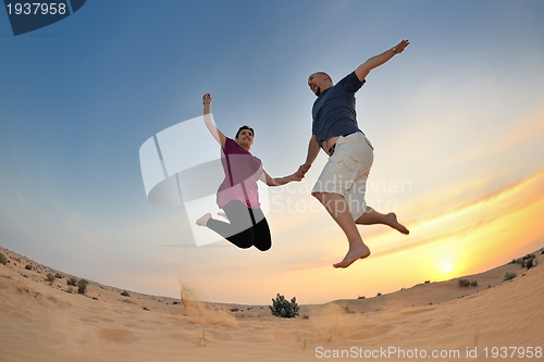 Image of couple enjoying the sunset