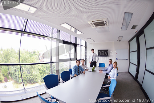 Image of business people in a meeting at office