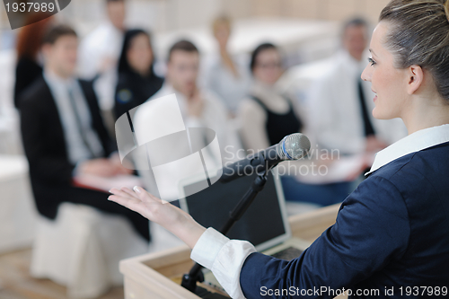 Image of business woman giving presentation