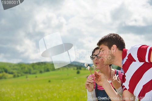 Image of romantic young couple in love together outdoor