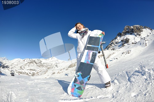 Image of skiing on fresh snow at winter season at beautiful sunny day