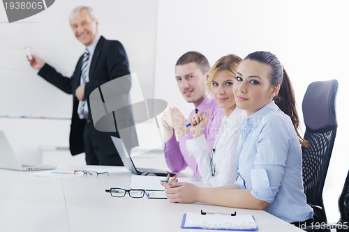 Image of Senior business man giving a presentation