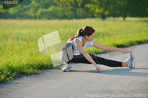 Image of woman stretching before fitness