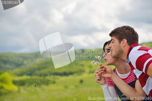 Image of romantic young couple in love together outdoor