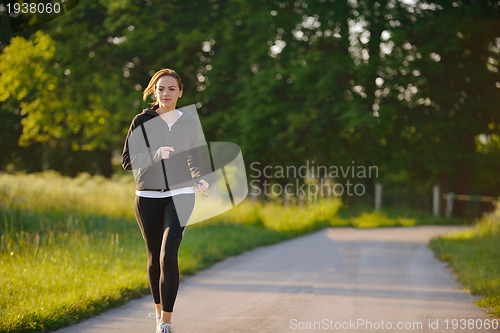 Image of Young couple jogging