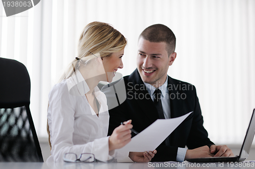 Image of business people in a meeting at office