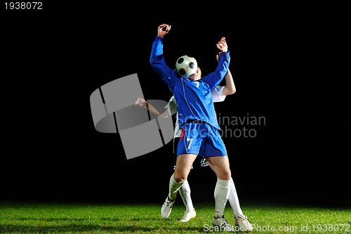 Image of football players in action for the ball