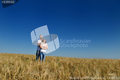 Image of happy couple in wheat field