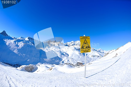 Image of Sign board at High mountains under snow in the winter