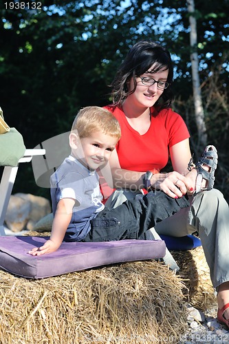 Image of woman and child have fun outdoor