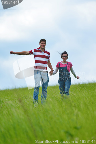 Image of romantic young couple in love together outdoor