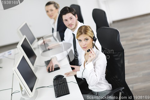 Image of business people group working in customer and help desk office