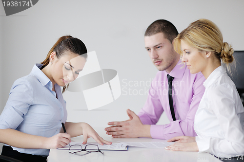 Image of Group of young business people at meeting
