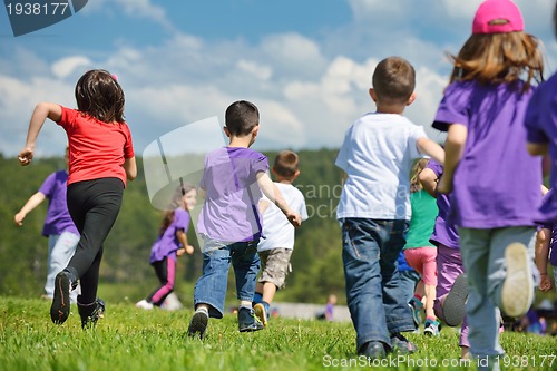 Image of happy kids group  have fun in nature