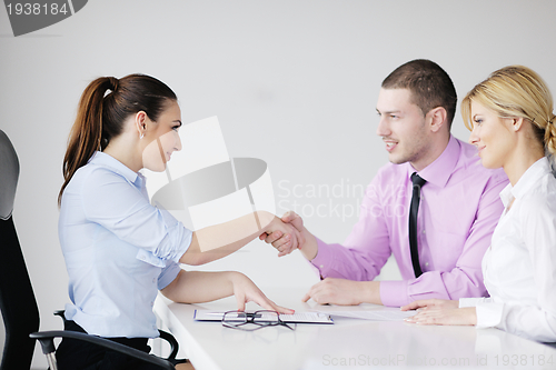 Image of Group of young business people at meeting