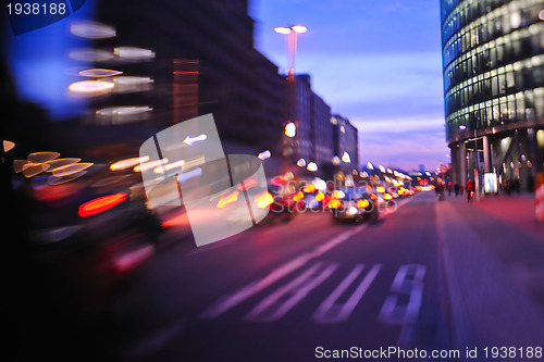 Image of City night with cars motion blurred light in busy street