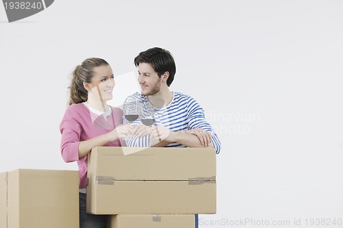 Image of Young couple moving in new home