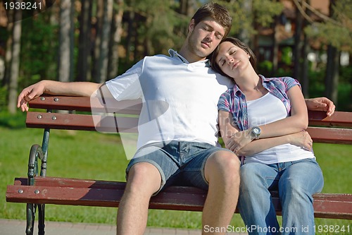Image of romantic young couple in love together outdoor