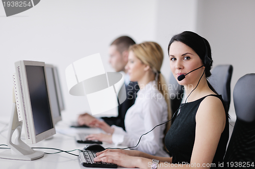 Image of business people group working in customer and help desk office