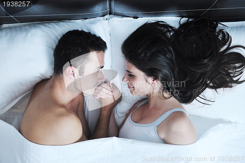 Image of young couple have good time in their bedroom