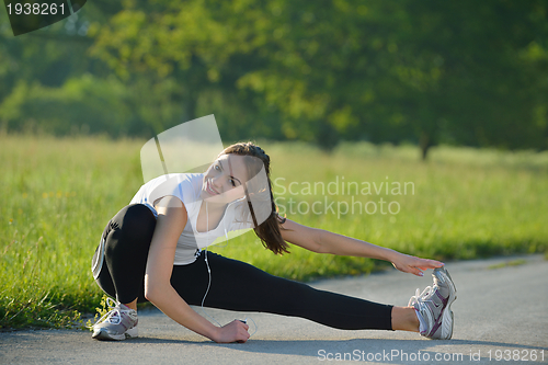 Image of woman stretching before fitness