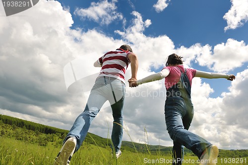 Image of romantic young couple in love together outdoor