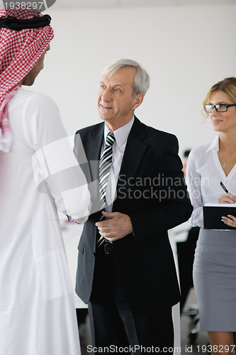Image of Arabic business man at meeting