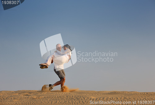 Image of couple enjoying the sunset
