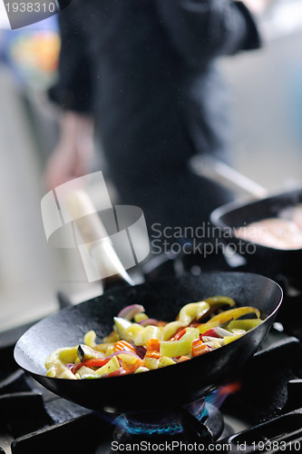 Image of chef preparing meal