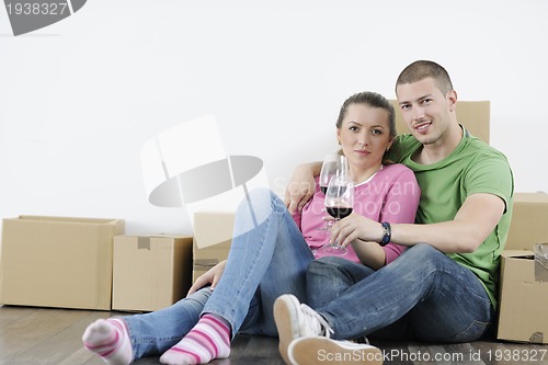 Image of Young couple moving in new home