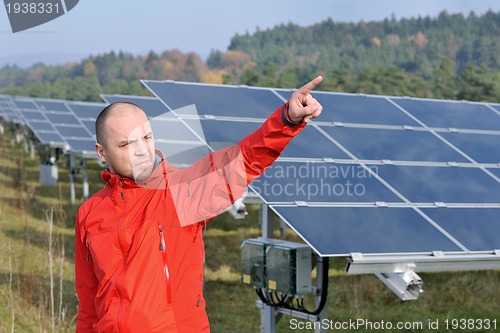 Image of Male solar panel engineer at work place