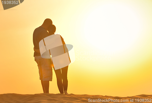 Image of couple enjoying the sunset