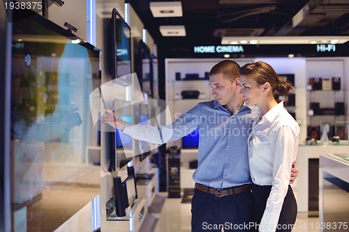 Image of people buy  in consumer electronics store