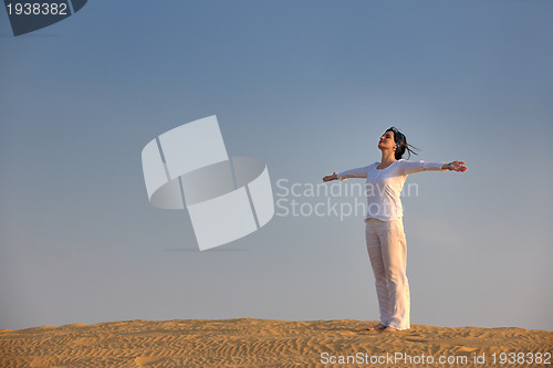 Image of woman relax in desert