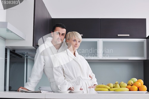 Image of young couple have fun in modern kitchen