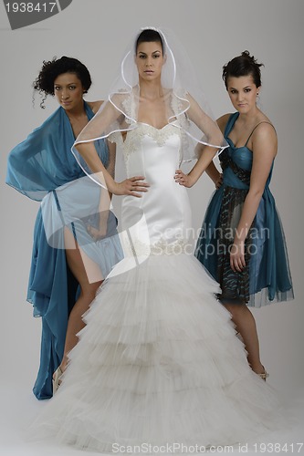 Image of portrait of a three beautiful woman in wedding dress