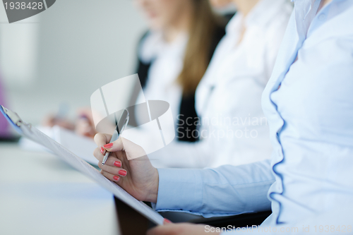 Image of Group of young business people at meeting
