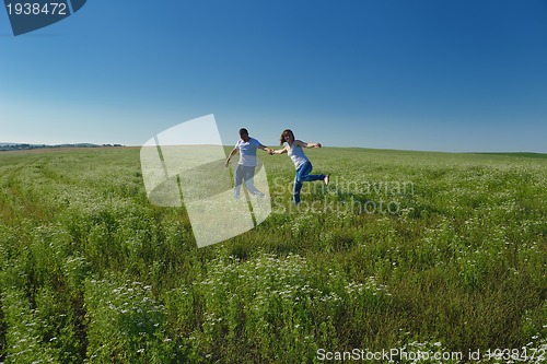 Image of happy couple in wheat field