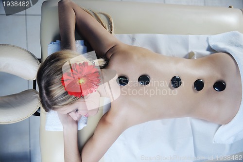 Image of Beautiful young woman in spa