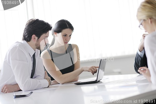 Image of business people in a meeting at office