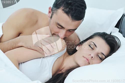 Image of young couple have good time in their bedroom