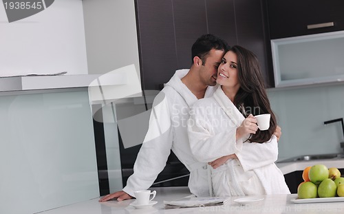 Image of young couple have fun in modern kitchen