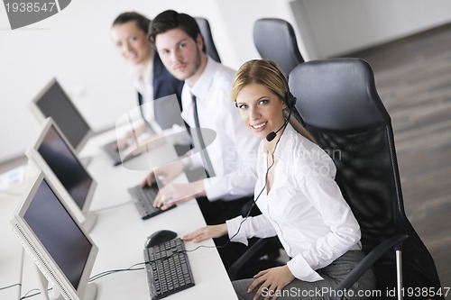 Image of business people group working in customer and help desk office