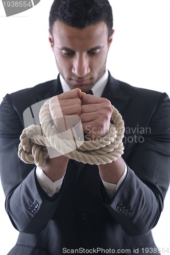 Image of business man with rope isolated on white background